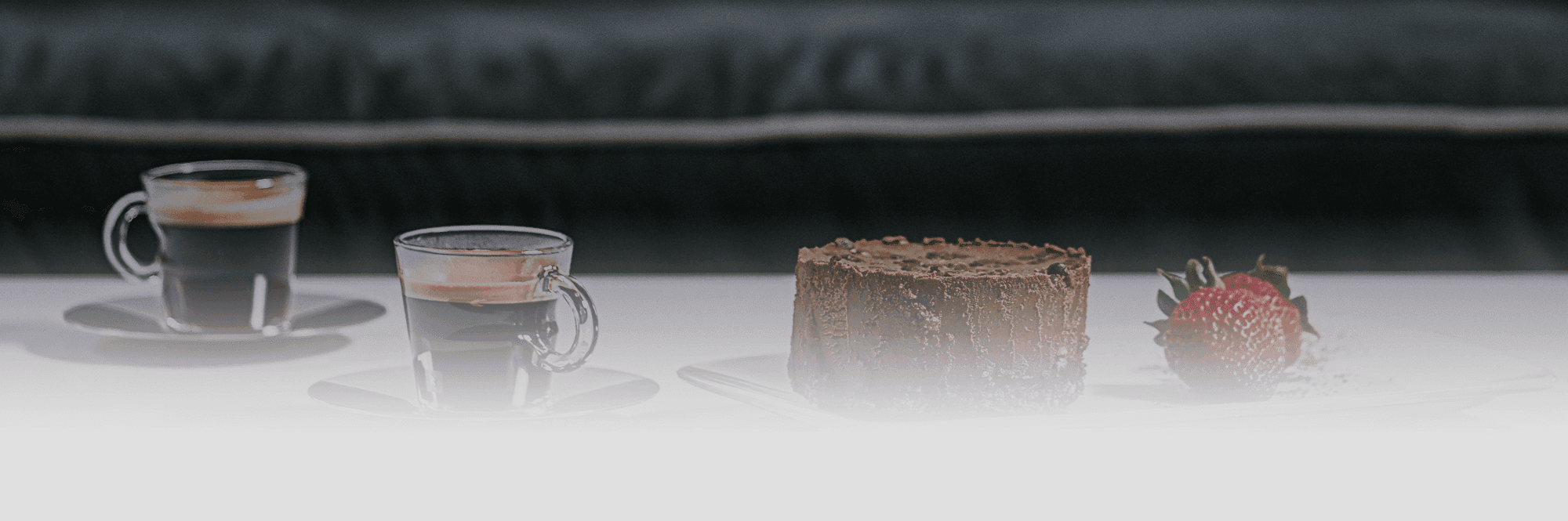 Contact header featuring coffee and cake