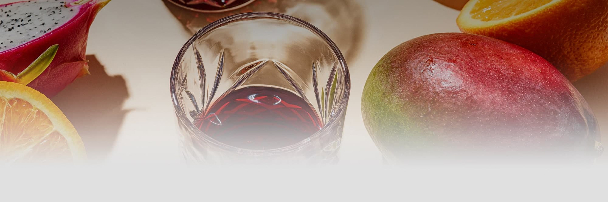 Portfolio header featuring fruit and wine