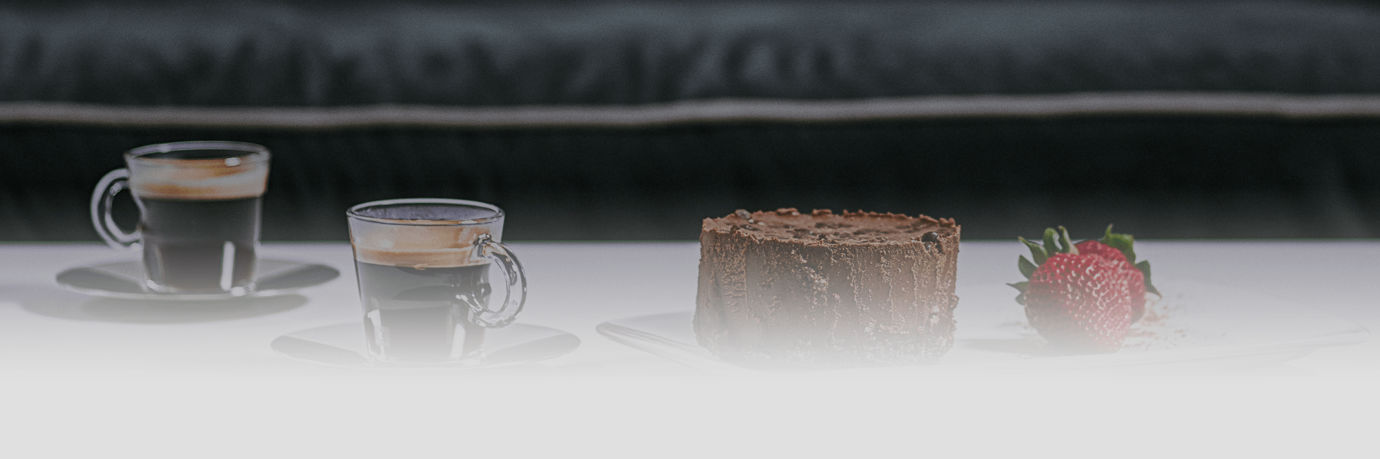 Contact header featuring coffee and cake